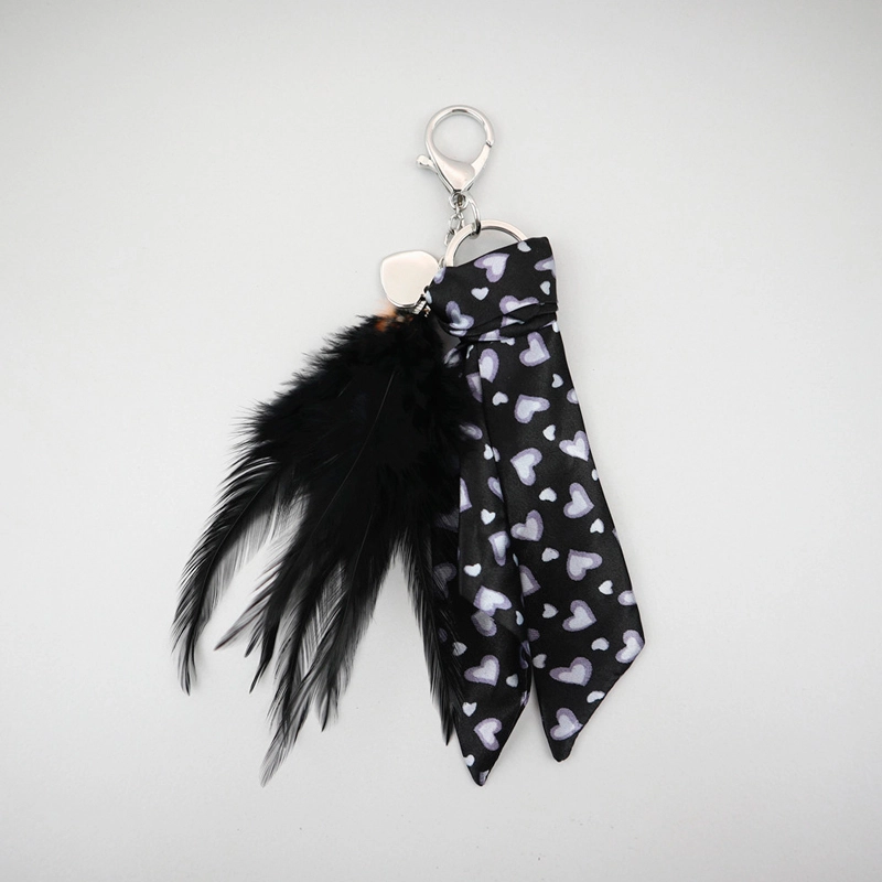 feather black heart keychain